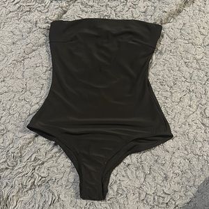 Fashionova brand black strapless body suit. Like new, barely used. Size XS